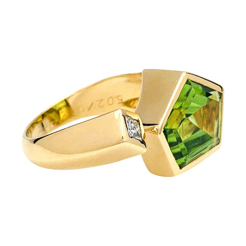 Bague 55 Bague en or jaune, diamant et péridot. 58 Facettes 29947