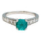 Bague 57 Bague émeraude en or blanc et diamants. 58 Facettes 30589