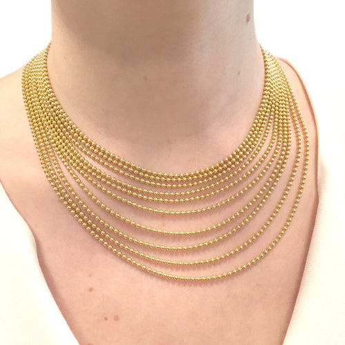 Collier Collier Cartier, "Draperie", en or jaune. 58 Facettes 28500
