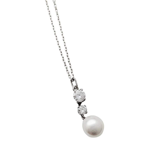 Collier Collier en or blanc diamants et perle. 58 Facettes 30296