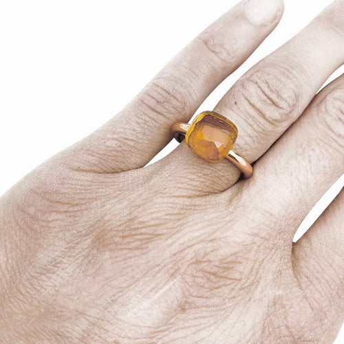 Bague 54 Bague Pomellato "Nudo" en or rose 750/000 sertie d'une citrine. 58 Facettes 30328