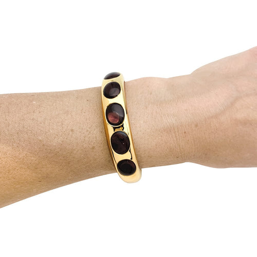 Bracelet Bracelet Pomellato "Bisanzio" en or jaune et grenats. 58 Facettes 29857