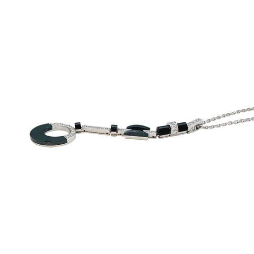 Collier Collier Cartier "Attraction" en or blanc, diamants, onyx et nacre. 58 Facettes 30008