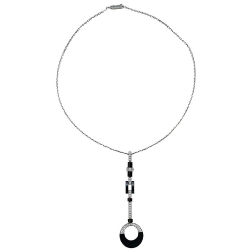 Collier Collier Cartier "Attraction" en or blanc, diamants, onyx et nacre. 58 Facettes 30008