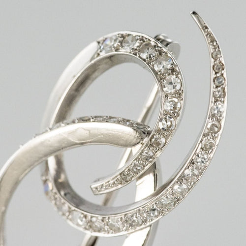 Broche Broche en or blanc et diamants 58 Facettes 19-156