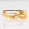 Broche Broche noeud or jaune 58 Facettes 20-235