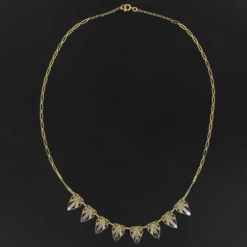 Collier Collier draperie ancienne or jaune et or blanc 58 Facettes 16-280