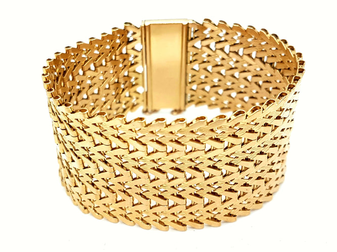 Bracelet Bracelet Manchette Or jaune 58 Facettes 00035CN