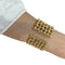 Bracelet Bracelet Manchette Hermès en or jaune. 58 Facettes 30059