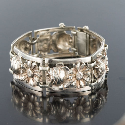 Bracelet Bracelet ancien argent fleurs 58 Facettes 19-148