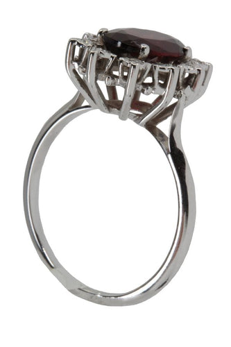 Bague Bague marguerite grenat et diamants 58 Facettes 037211