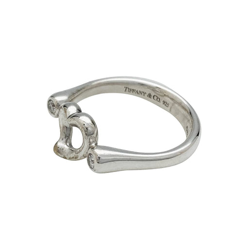 Bague 51 Bague Tiffany & Co. "Open heart" en argent et diamants. 58 Facettes 30462