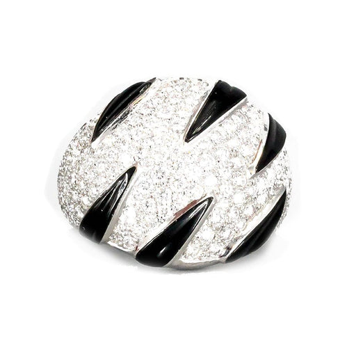 Bague 50 Bague Cartier "Griffes" en or blanc, diamants et onyx. 58 Facettes 25488
