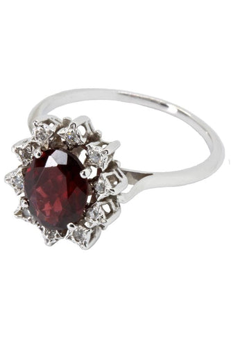 Bague Bague marguerite grenat et diamants 58 Facettes 037211