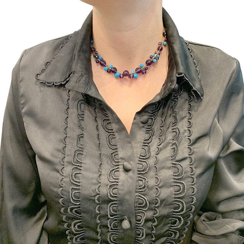 Collier Collier Cartier "Délices de Goa" en or jaune, améthyste, turquoises et diamants. 58 Facettes 30007
