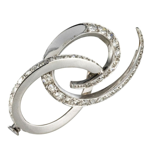 Broche Broche en or blanc et diamants 58 Facettes 19-156