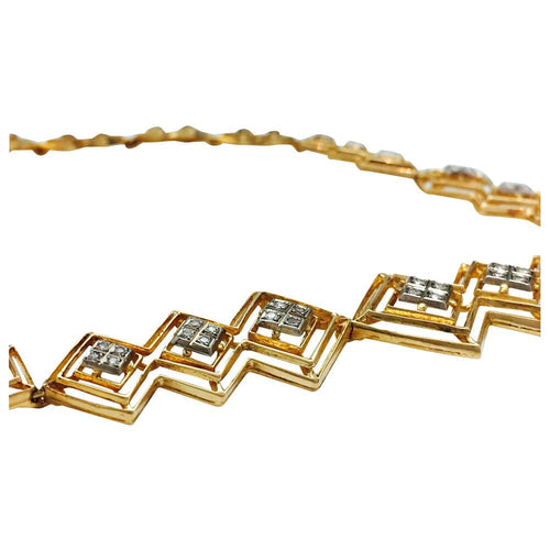 Collier Collier cravate Ilias Lalaounis en or jaune et diamants. 58 Facettes 27956