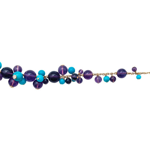 Collier Collier Cartier "Délices de Goa" en or jaune, améthyste, turquoises et diamants. 58 Facettes 30007