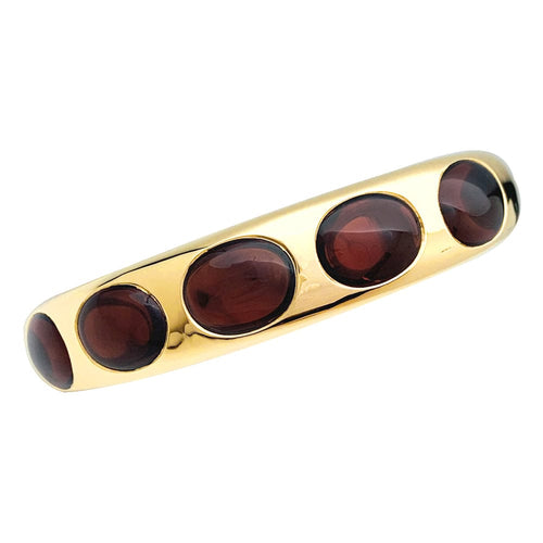 Bracelet Bracelet Pomellato "Bisanzio" en or jaune et grenats. 58 Facettes 29857