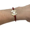Bracelet Bracelet O.J. Perrin, "Féerie de Légendes", or jaune sur cordon. 58 Facettes 30341